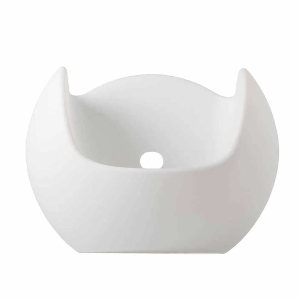 Heller Schaukelsessel im modernen Design Slide Blos